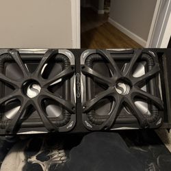 Two solo X Kickers 12 Inch And Ground Shaker Box