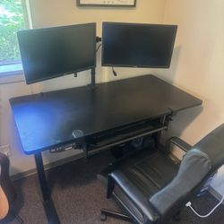 Standing Desk with dual monitors and desk chair 