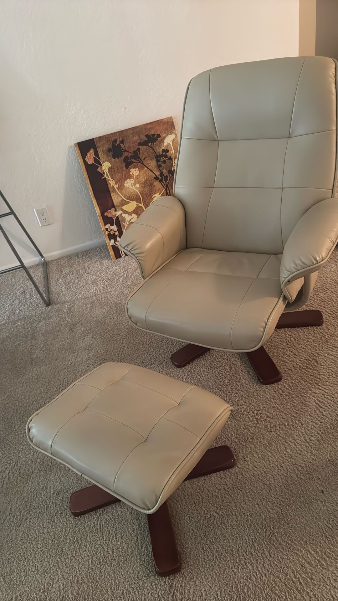 Cream/beige faux leather recliner chair with matching ottoman