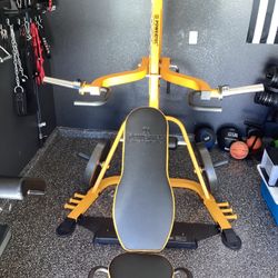 POWERTEC LEVER GYM WITH SEVERAL ADDED ATTACHMENTS 