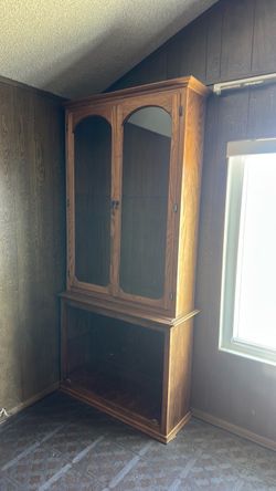 Two oak cabinets