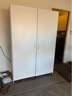 Pantry style storage cabinet