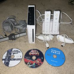 Wii Console With Rechargeable Remotes And 3 Games