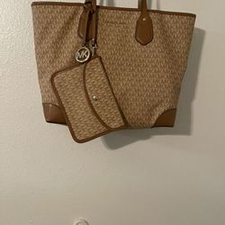 Large Open Space Mk Purse With Pouch Brown/ Tan In Color