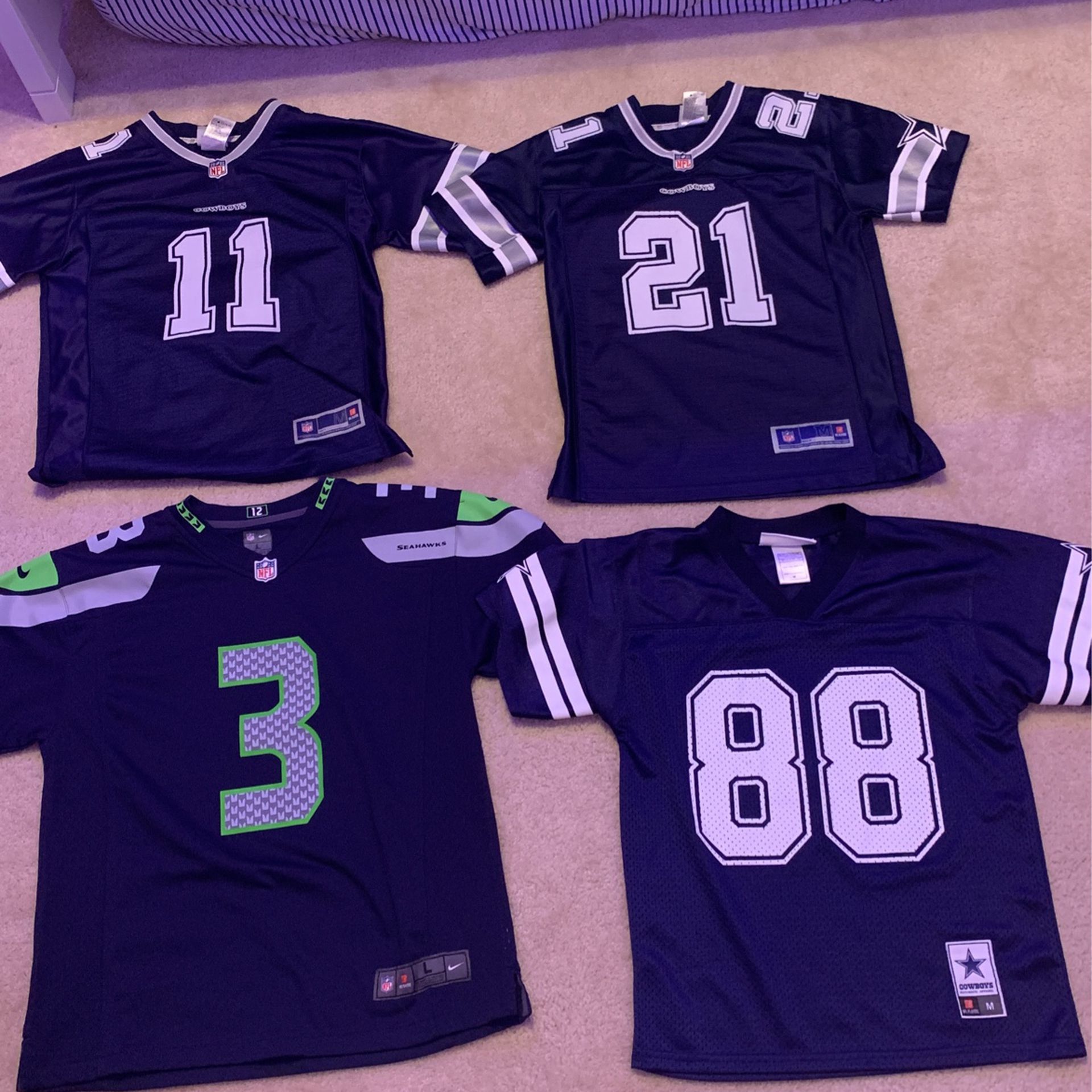 4 NFL jerseys