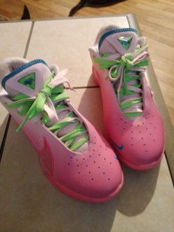 Lebron James pink female lNikes. Size 8.5