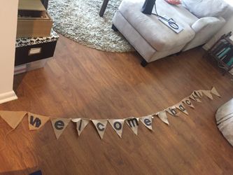 Hanging burlap sign