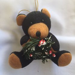 Christmas teddy bear with wreath