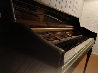 Moving till piano restored and in tune