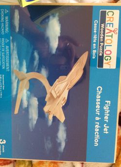 Wooden puzzle fighter jet