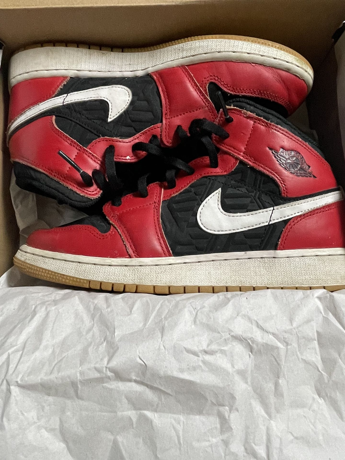 Black and red Jordan one