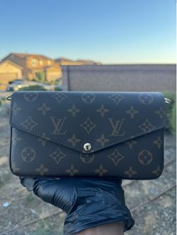 Woman Louis Vuitton purse