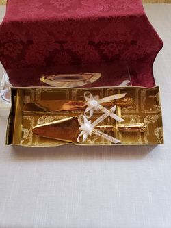 Gold plated cake knives (Nuestra Boda)