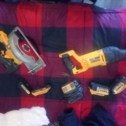 Package Deal 4 DeWalt Batteries And Skill Saw And A  Sawsaw