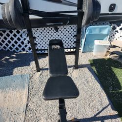 Weight Bench And 100 Pounds Of Weight
