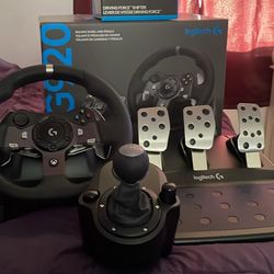 Logitech G923 racing wheel and pedals with shifter
