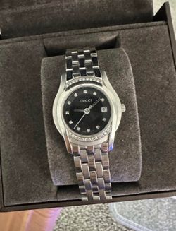 Authentic Gucci watch with diamond accents (Women)