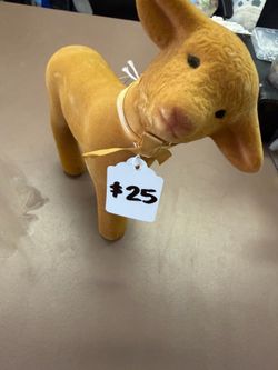 This is a vintage 1990s flocked lamb figurine from The Ashton-Drake Galleries "Little Bo Peep" series.