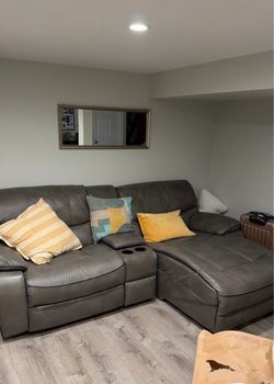 Dark grey recliner couch