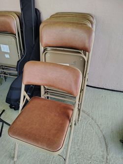 Brown leather metal folding chairs