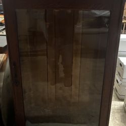 Antique curio cabinet with a glass door rare