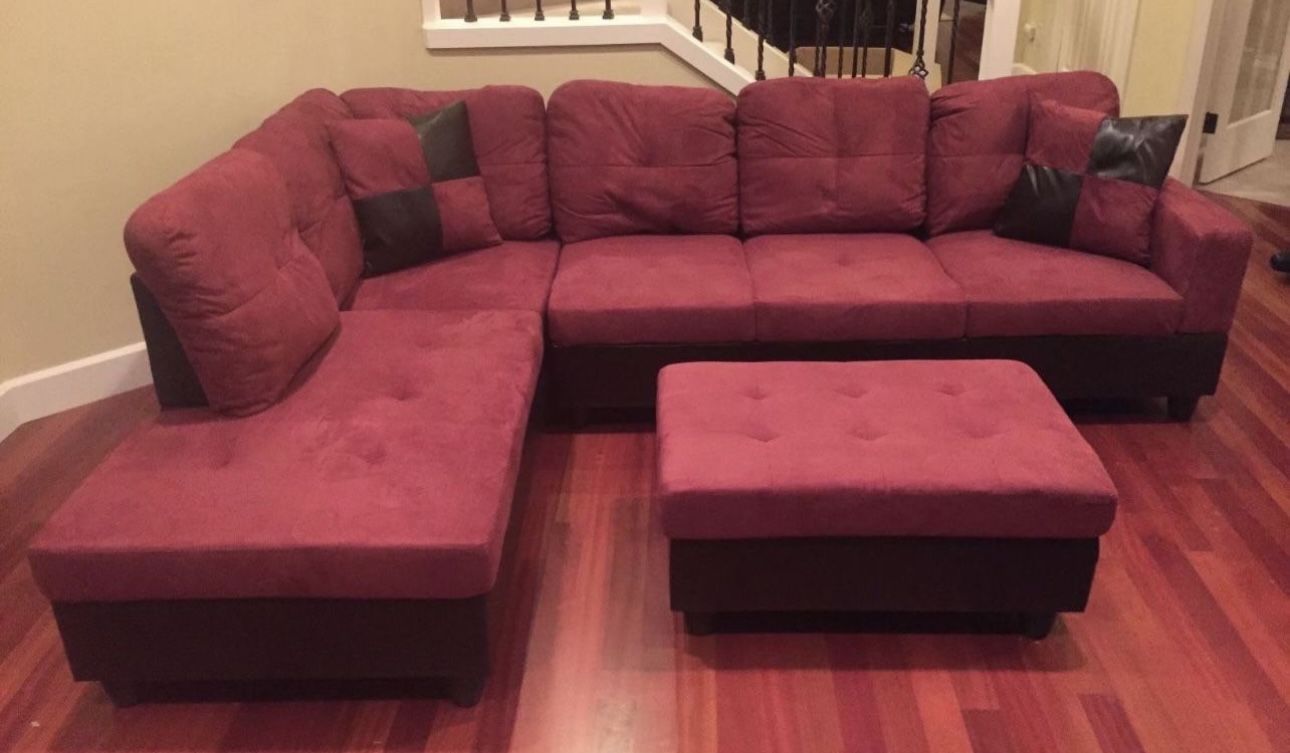 Red microfiber sectional couch and ottoman