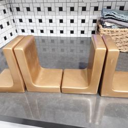 Bookends- L shaped, gold, set of 4. Cement/concrete