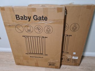 Two 26 Inch Door Style Metal Baby Gates