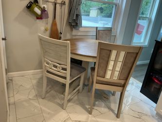A round Farmhouse, wayfair dinning table (42” diameter x 25” tall) with3 chairs the same and 2 with glass on their back, high quality (all for $70)