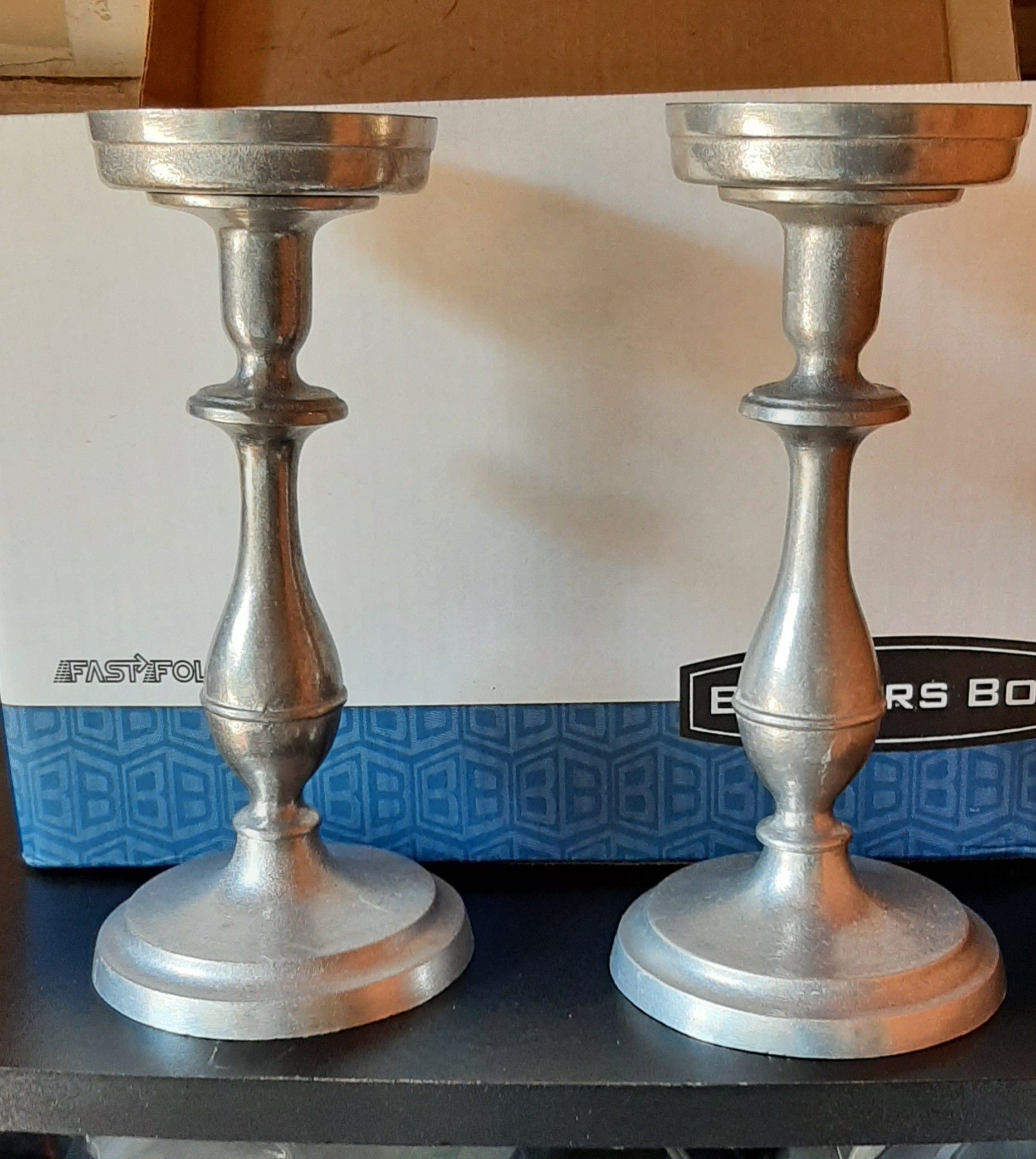 Pewter candlesticks suitable for tapers and pedestal candles with extra base added