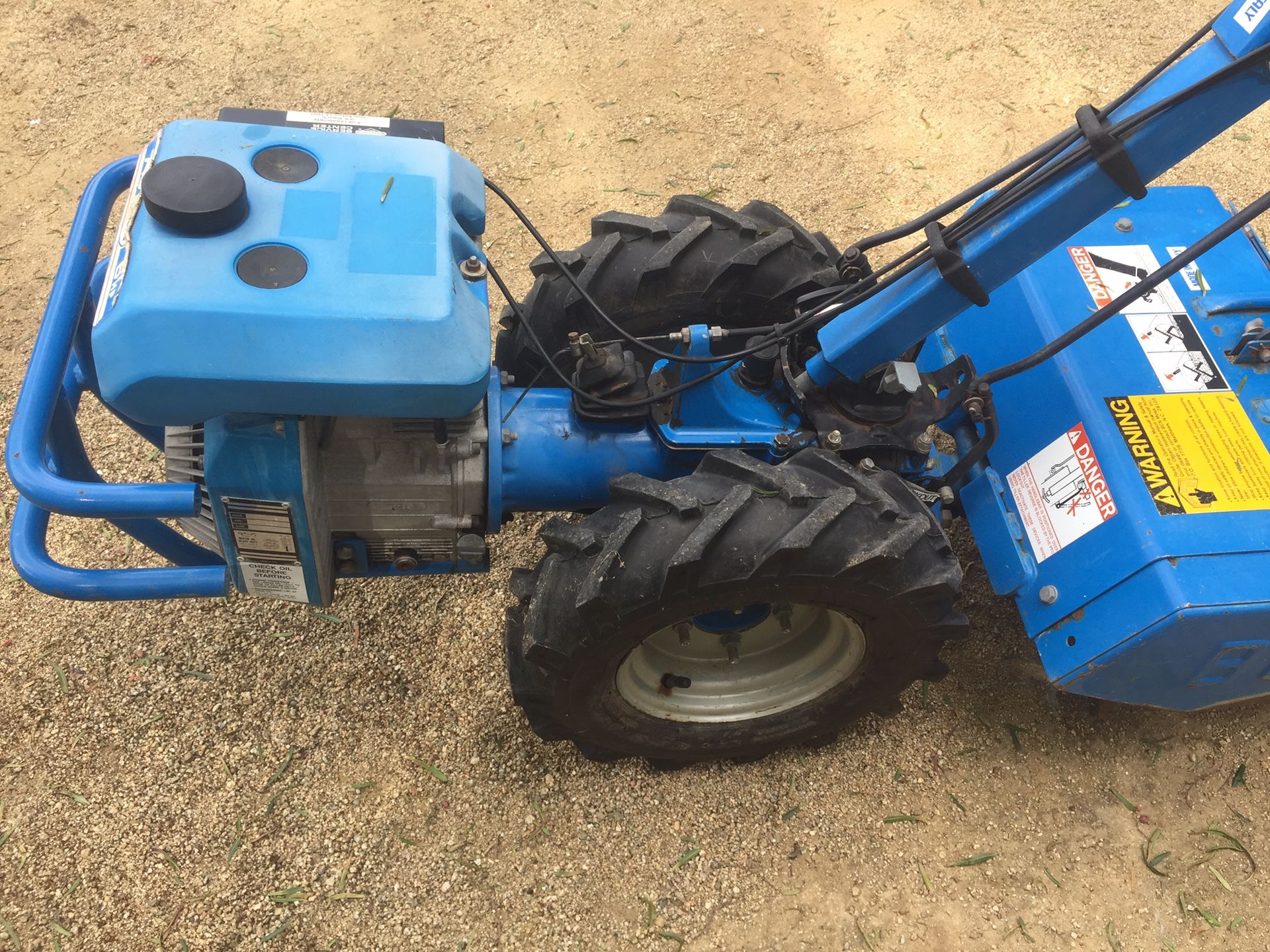 BCS model 715 walkbehind tractor with rear tine tiller attachment. for