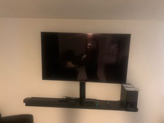Large Flat Screen TV with Wall Mount
