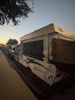 2013 Jayco Baja Toy hauler pop up 22’