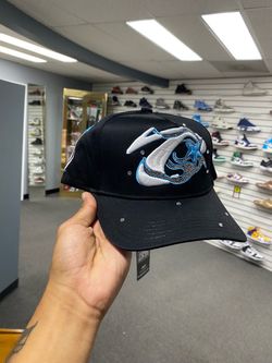 Black Snapback Hat with Embroidered Logo