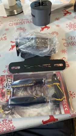 Universal break lamp and signal light and license plate holder