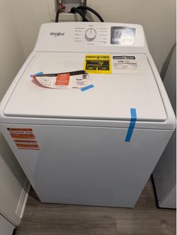Brand new Whirlpool top load washer for sale.