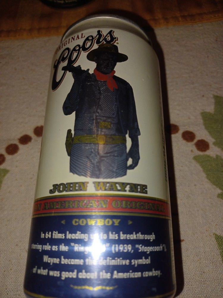JOHN WAYNE COLLECTABLE COORS CANS.NEVER OPENED