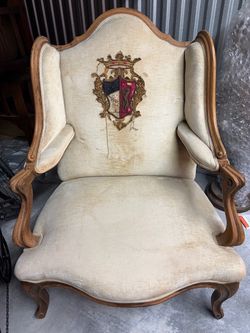 Vintage crest wingback chair