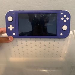 Nintendo Switch Lite With Case And Assassins Creed 