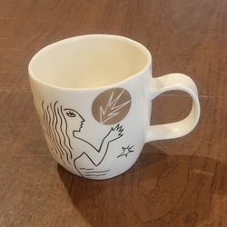 2013 Starbucks Anniversary White Gold Etched Mermaid Siren Coffee Cup 
Mug 12oz. New, still with tag. Box is missing. Height 3.75". Weight10 oz 
plus 