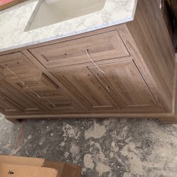 Ikea double bathroom cabinet, never used, includes granite stone, measures 60 x 19 inches