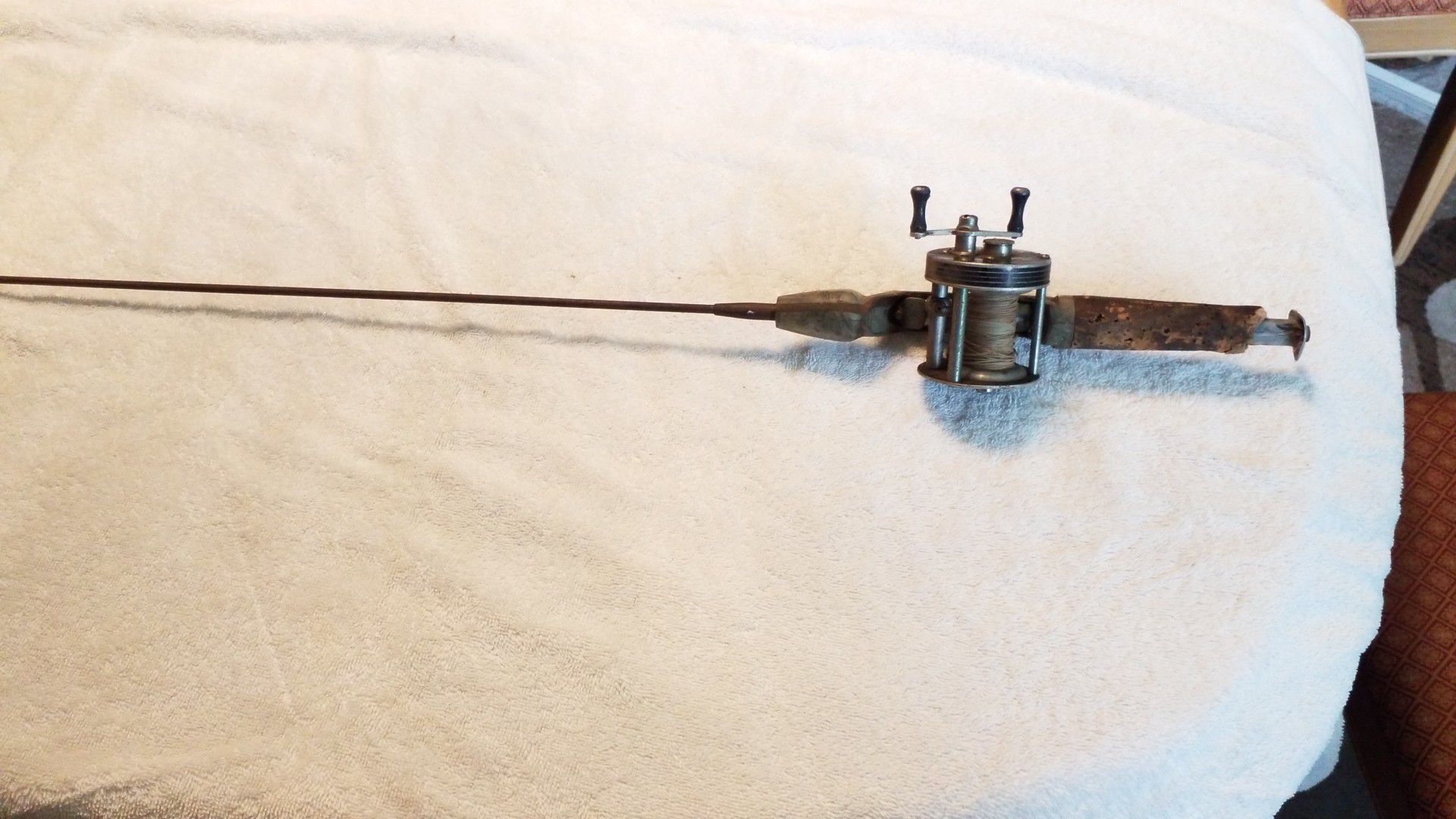 Antique Langley "streamlite" fishing real with a "steel" rod. ( early 1950's)