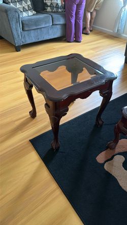 3 wood table with glass in the middle