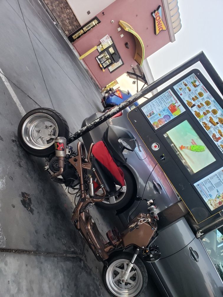 Honda ruckus with new GY6 motor.