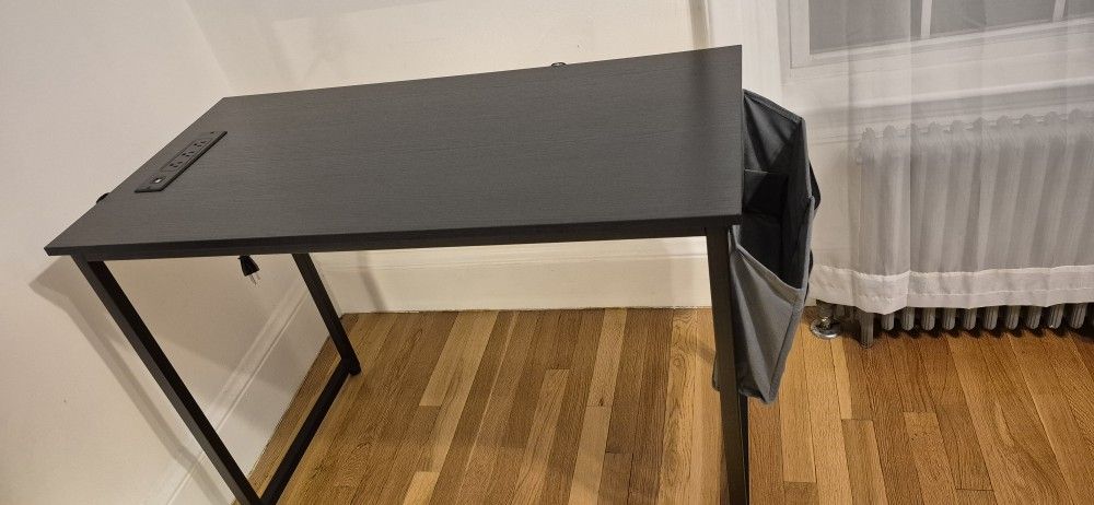 Office/computer desk with a socket and organizer