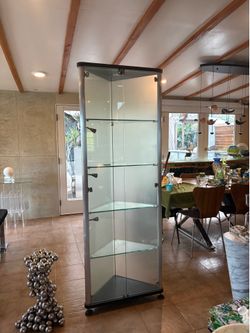 Made in German in the 1990’s  Modern Tall Curio Cabinet with light build in
