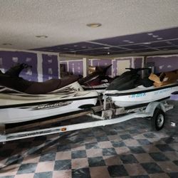 3  jet ski's with trailer all run good, come with titles.