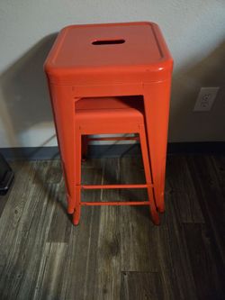 Free orange metal stools