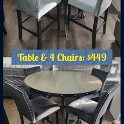 Brand New Dining Set 
Counter Height
Round Table Brown Top
Solid Wood 
Light Blue Or Black Chairs Velvet
$449 + Tax

 FREE LOCAL DELIVERY & SET UP
ONL