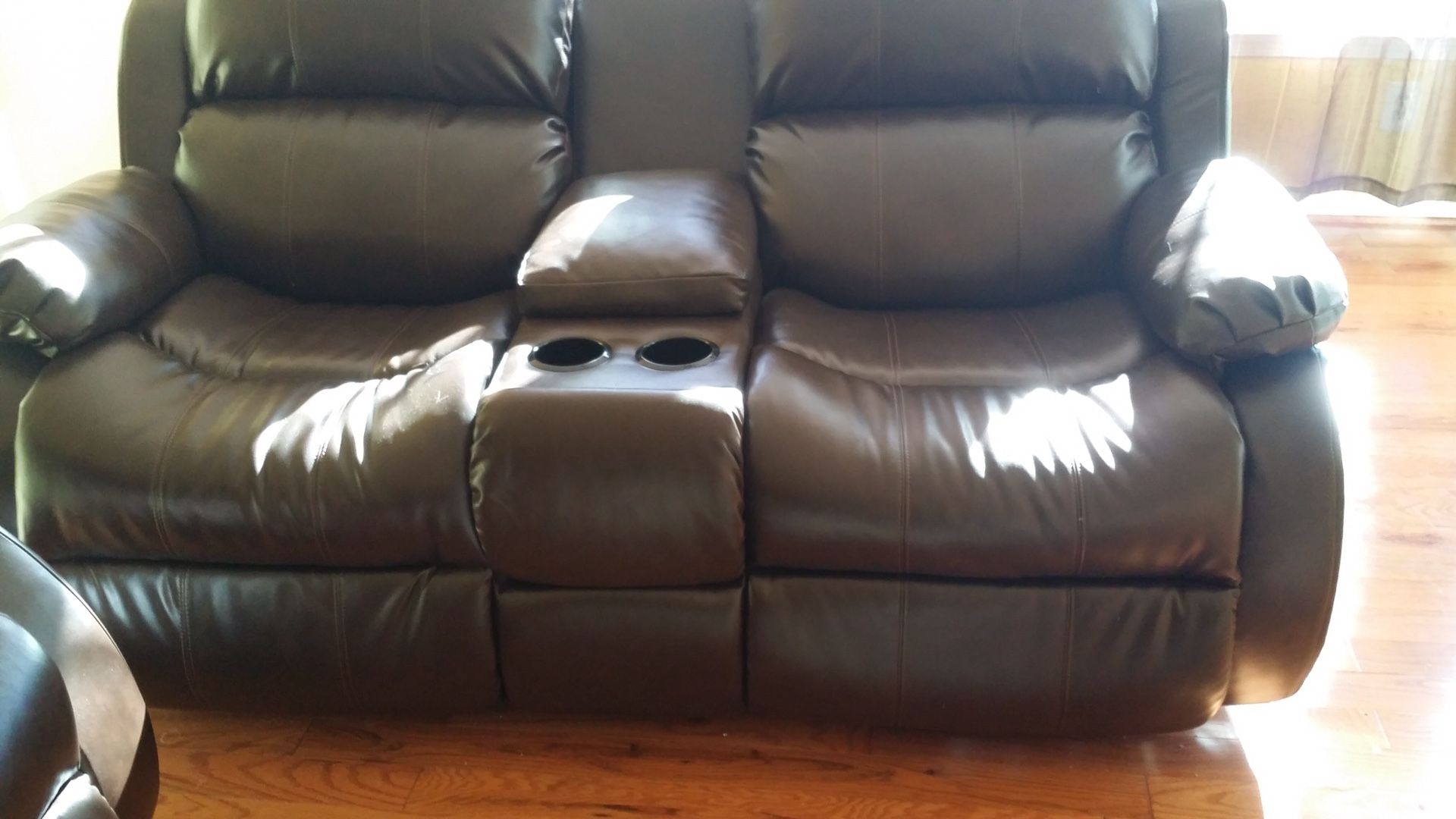 Ashley's sofa with a recliner